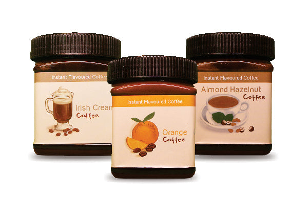 A product image of Hetal's Homemade signature collection coffee combo. The image shows a product photo for Hetal's Flavoured instant coffee range. The photo includes images of Orange, irish cream and almond hazelnut flavoured instant coffee.